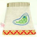 Green bird pouch in natural..