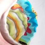 Green bird pouch in natural..